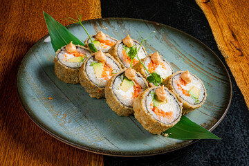 Crispy sushi rolls artfully arranged, showcasing vibrant colors and textures