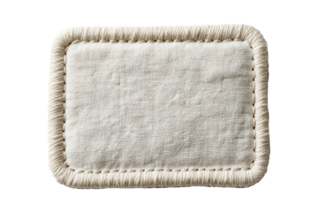 Blank off-white fabric label with a stitched border, isolated on a PNG
