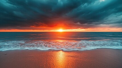Beautiful Sunrise or Sunset at Sea, Dark Clouds Forming Rain in the Distance with Sandy Beach