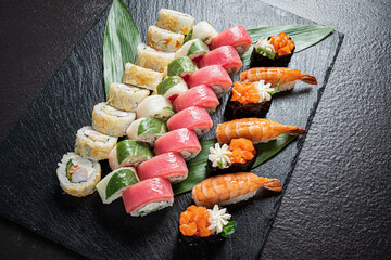 Succulent sushi arrangement features vibrant rolls and fresh seafood, perfect for a delightful meal
