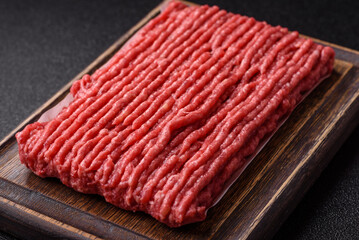 Raw ground beef or pork with salt and spices