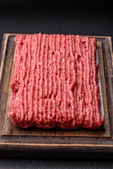 Raw ground beef or pork with salt and spices