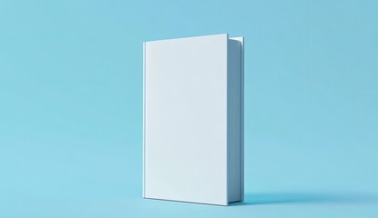 Blank white book on a light blue background