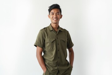 Half-Length (Waist-Up) portrait of young stylish smiling Nepalese male model in military wear isolated on pure white background looking at camera