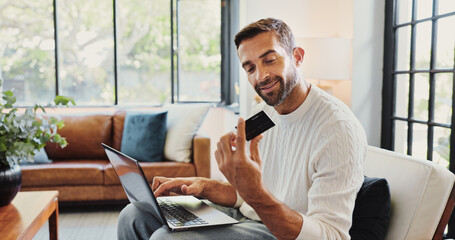 Home, man and smile with laptop for credit card, password or banking app for subscription. House,...