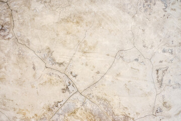 Textured marble surface with cracks and spots