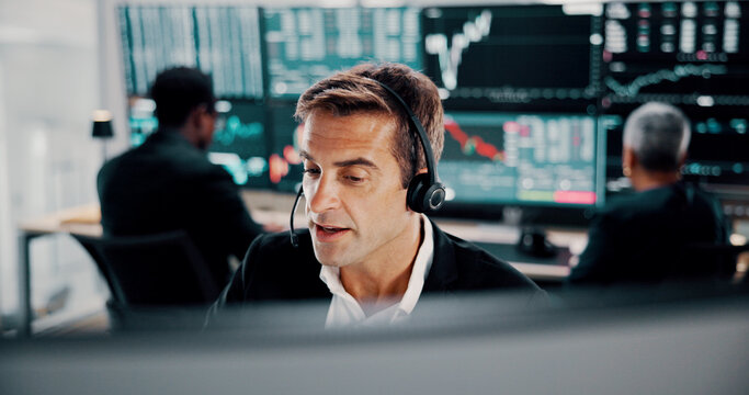 Financial broker, man and headset by computer for customer service, trading investment or market insight. Call center, stocks advisor and client query for finance news, deal negotiation or assistance