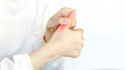 Naklejka premium Wrist pain chronic therapy concept. Hands performing a thumb exercise for flexibility and strength.