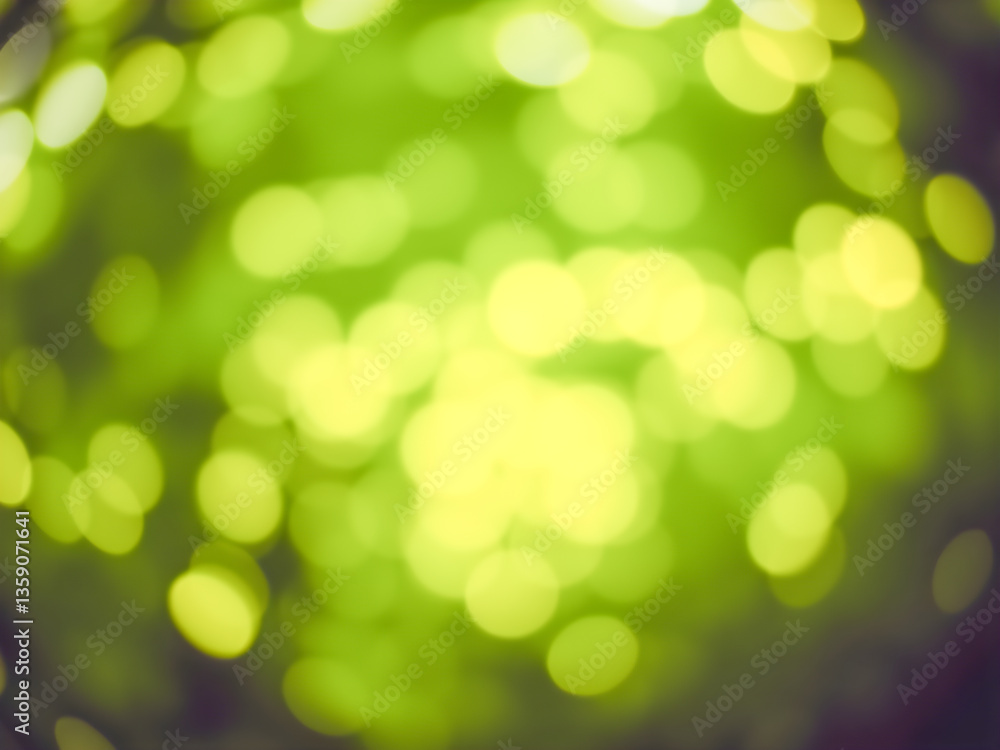 Aufkleber abstract circular colorful bokeh from the party light on green background