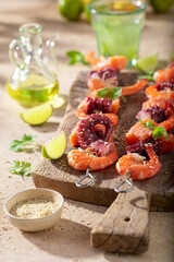 Preparation of spicy grilled skewer as a Mediterranean dinner.