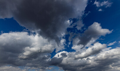 The sky is cloudy and the sun is shining through the clouds