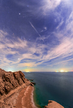 Winter constellations over sea