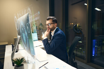 Professional Cybersecurity Expert Working On Transparent Interface Display In Modern Office