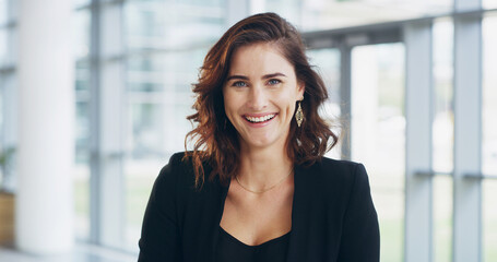 Business, portrait and happy woman in office with confidence for property development opportunity....