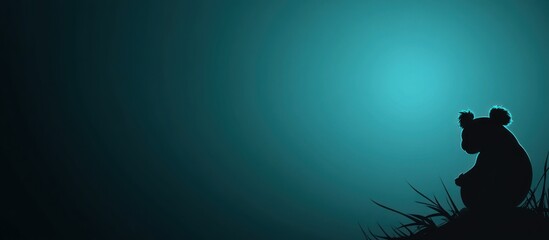 Lonely Koala Silhouette at Dusk.