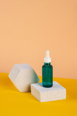 Cosmetic product in tube, bottle, lotion or serum with stylish props on cream background. 