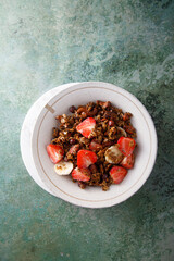 Homemade granola with fresh strawberry