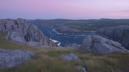 Coastal cliffs, ocean inlet at dusk.