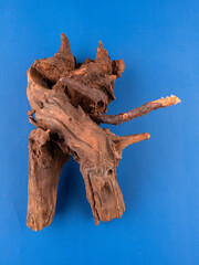 Detailed view of rustic driftwood, perfect for aquariums or terrariums no  purple background.