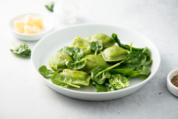 Homemade spinach ravioli with parmesan cheese