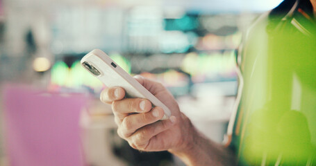 Business, hands and man in workplace, smartphone and message to contact, media agency and scroll....