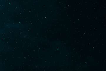 Starry night sky. Galaxy space. Glowing stars in the night. New Year, Christmas and celebration background concept