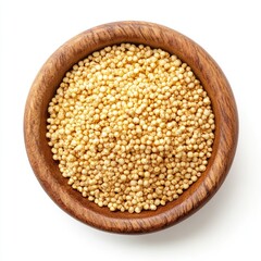 A wooden bowl holds isolated brown buckwheat and yellow mustard seeds, raw organic grains