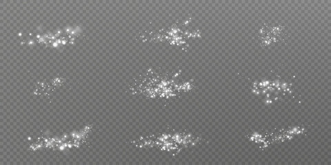 White dust of glowing white light effects with bokeh effect on transparent background. 