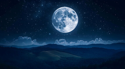 A full moon shines over a misty mountain range with scattered clouds and a starry night sky in a cool dark blue tone