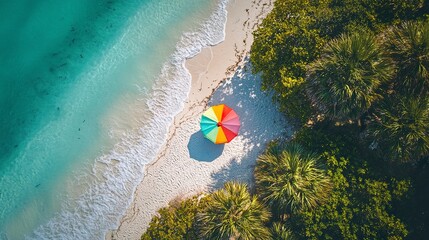 Obraz premium Florida beach scene, cheerful colorful umbrella set against turquoise waters, lush palms framing the sandy shoreline, sunny and inviting 