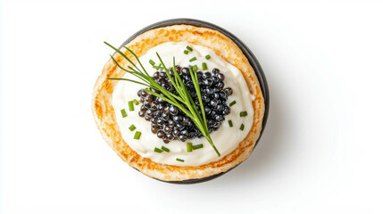 Gourmet black caviar on blini with cream and chives for culinary presentation and menu design