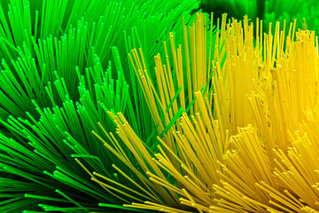 Abstract Fiber Optic Bristles in Vibrant Green and Yellow. Close-up of Colorful Synthetic Bristles