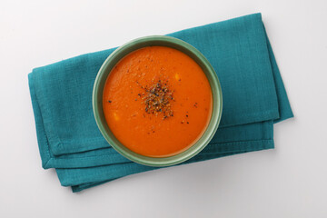 Tomato soup made with tomato, carrot, and ginger