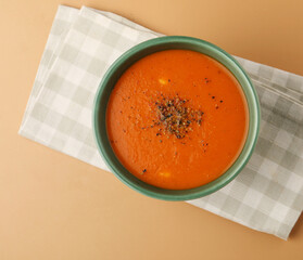 Tomato soup made with tomato, carrot, and ginger