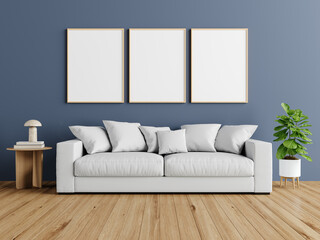 Modern Living Room with Blue Wall, White Sofa, and Art