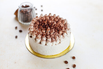 Traditional italian desert tiramisu in a jar.