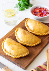 Baked empanadas. Latin American cuisine. Recipe. Fast food.