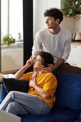 Obraz premium Embracing love in a stylish apartment as a modern couple enjoys their time together