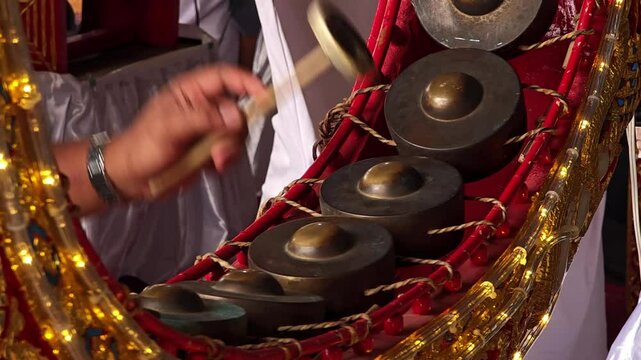 "Kong Mon" is Thai musical instruments that made from metal and wood.