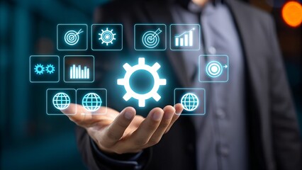 Automatic control system with modern technology for business management, businessman hand touching gears icon showing automation software operation