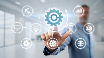 Automatic control system with modern technology for business management, businessman hand touching gears icon showing automation software operation