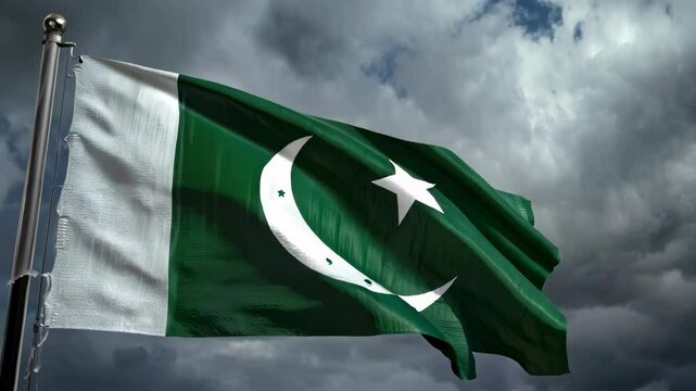 Majestic pakistan flag waving against dynamic cloudy sky capturing national pride and heritage in motion