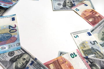 Banknotes of 100 dollar Banknotes of 100 euros Background of cash dollar and euro bills. American currency European currency United States Cash banknotes Financial Money background concept.