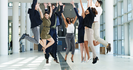 Business, people and jump for success in office with celebration, financial deal and team achievement. Staff, cheers and group with energy for good news, investment announcement and promotion winner