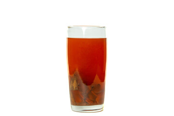 Wedang Uwuh, Healthy Drink from Indonesia that contain rock sugar, ginger, cinnamon leaves, clove leaves, nutmeg leaves, Biancaea sappan. 