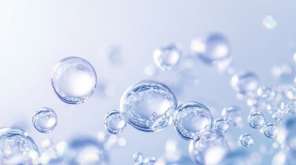 Many transparent water bubbles floating in a cool light environment