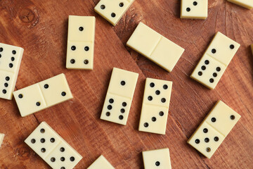 White dominos blocks on wooden background