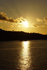 A stunning orange sunset over the calm Indian Ocean, Africa