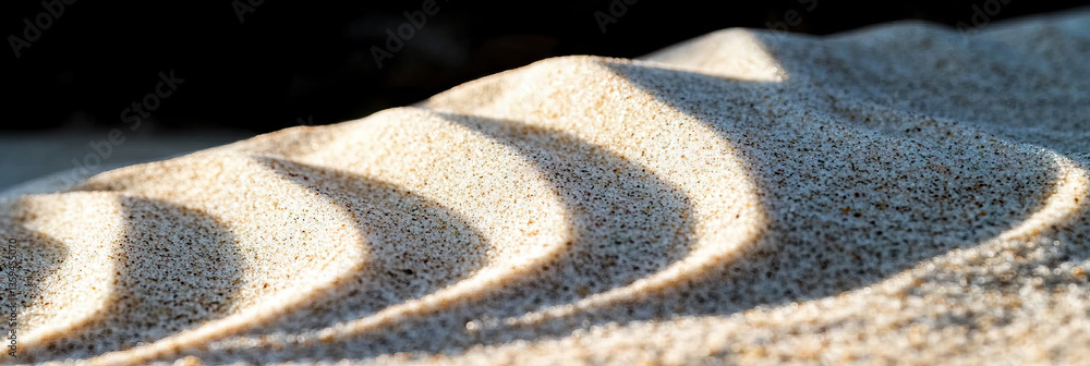 Poster sand surface with wave pattern and shadowing