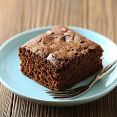 Delicious Chocolate Brownie on Blue Plate Close Up